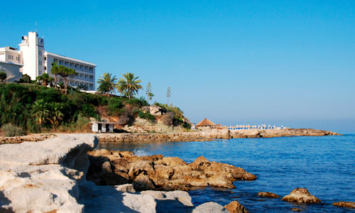 Beach-hotel-on-a-rocky-beach-at-Paphos-area-in-Cyprus_shutterstock_9857020_7331